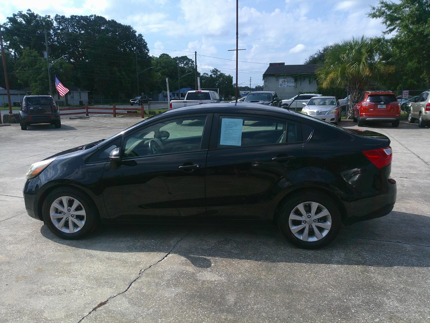 2013 BLACK KIA RIO EX; SX (KNADN4A3XD6) , located at 1200 Cassat Avenue, Jacksonville, FL, 32205, (904) 695-1885, 30.302404, -81.731033 - Photo#1